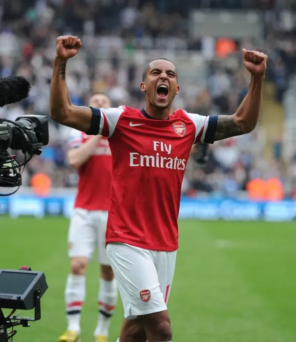Framed Print : Theo Walcott's Celebration: Arsenal's Victory over Newcastle United (2012-13) Framed Print : Theo Walcott's Celebration: Arsenal's Victory over Newcastle United (2012-13)