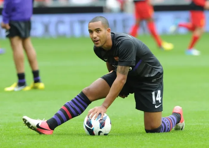 Framed Print : Theo Walcott's Determined Look Before the Liverpool vs Arsenal Premier League Clash (2012-13)