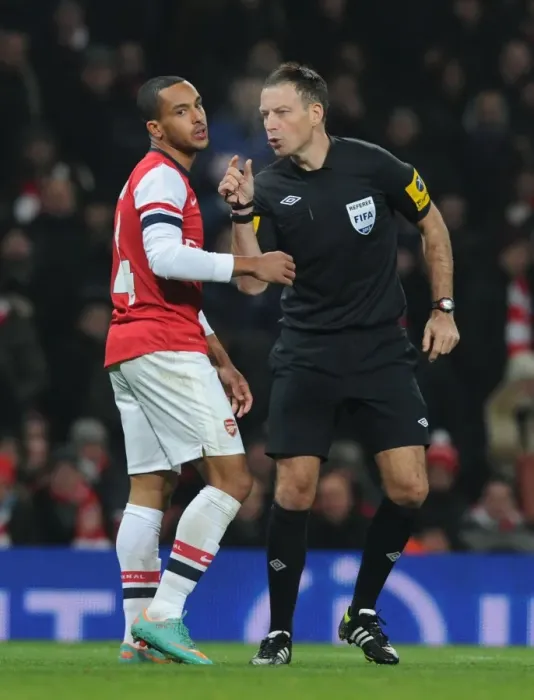 Framed Print : Theo Walcott's Dispute with Ref Mark Clattenberg: Arsenal vs Swansea FA Cup Replay Framed Print : Theo Walcott's Dispute with Ref Mark Clattenberg: Arsenal vs Swansea FA Cup Replay