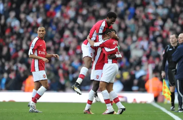 Framed Print : Theo Walcott's Double: Arsenal Celebrates with Eboue, Diaby, and Clichy (3-1 vs Burnley, 2010)