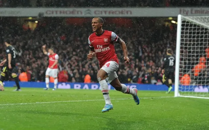 Framed Print : Theo Walcott's Double: Arsenal's Exhilarating 2-1 Win Over Wigan Athletic (2012-13) in the Premier League Framed Print : Theo Walcott's Double: Arsenal's Exhilarating 2-1 Win Over Wigan Athletic (2012-13) in the Premier League