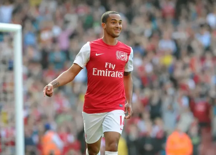 Framed Print : Theo Walcott's Double: Arsenal's Triumphant 3-0 Victory Over Aston Villa in the Premier League Framed Print : Theo Walcott's Double: Arsenal's Triumphant 3-0 Victory Over Aston Villa in the Premier League