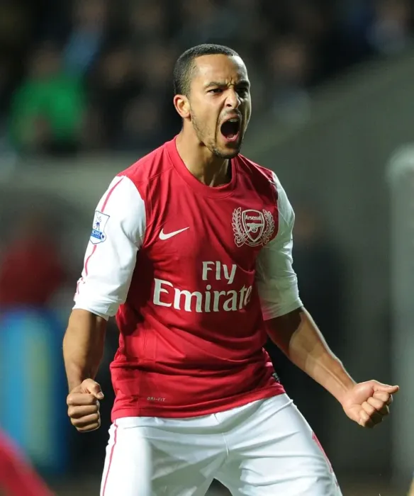 Framed Print : Theo Walcott's Double Strike: Arsenal's Triumph over Swansea City (2011-12)
