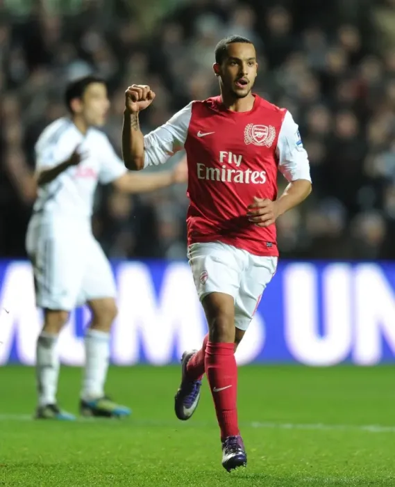 Framed Print : Theo Walcott's Double Strike: Swansea City vs. Arsenal, Premier League 2011-12 Framed Print : Theo Walcott's Double Strike: Swansea City vs. Arsenal, Premier League 2011-12