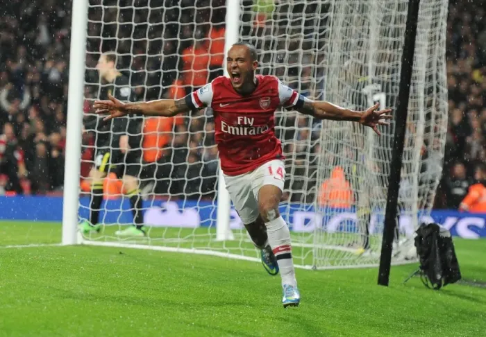 Framed Print : Theo Walcott's Double: Thrilling Arsenal Victory Over Wigan Athletic (2012-13) in the Premier League
