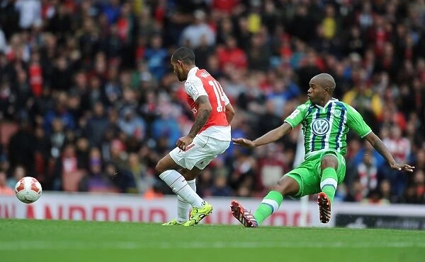 Theo Walcott's Dramatic Goal: Arsenal Edges Past VfL Wolfsburg in Emirates Cup Thriller