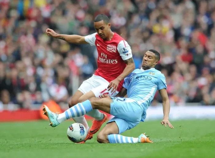 Framed Print : Theo Walcott's Electrifying Run: Arsenal vs Manchester City, Premier League 2011-12 - A Highlight of Arsenal Football Club Framed Print : Theo Walcott's Electrifying Run: Arsenal vs Manchester City, Premier League 2011-12 - A Highlight of Arsenal Football Club