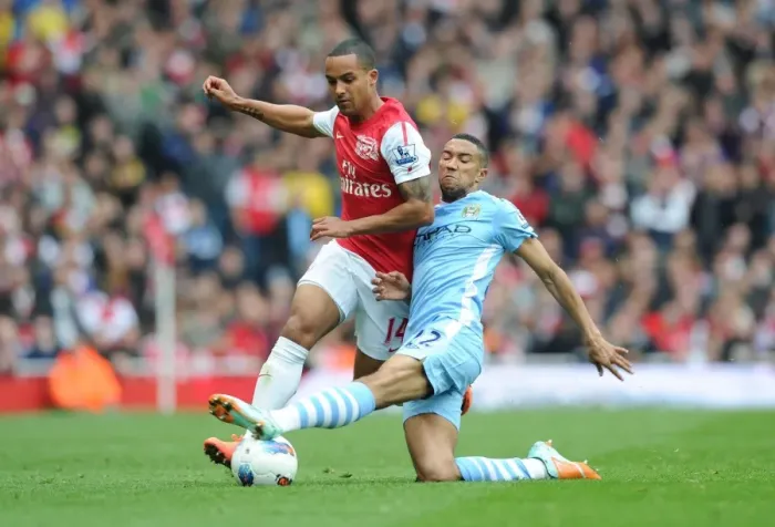Framed Print : Theo Walcott's Electrifying Run: Arsenal vs Manchester City, Premier League 2011-12 - A Highlight of Skill and Speed Framed Print : Theo Walcott's Electrifying Run: Arsenal vs Manchester City, Premier League 2011-12 - A Highlight of Skill and Speed