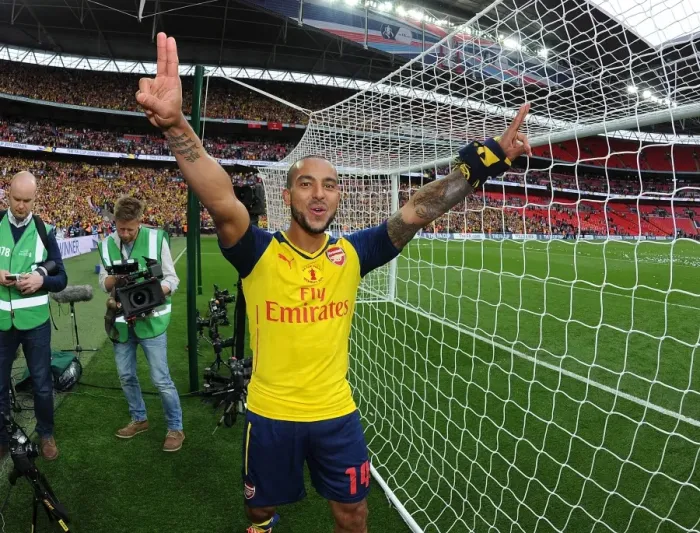 Framed Print : Theo Walcott's Emotional FA Cup Victory: Arsenal's Jubilant Celebration after Aston Villa Win Framed Print : Theo Walcott's Emotional FA Cup Victory: Arsenal's Jubilant Celebration after Aston Villa Win