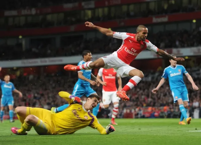 Framed Print : Theo Walcott's Epic Leap Over Costel Pantilimon (Arsenal vs Sunderland, 2014-15)