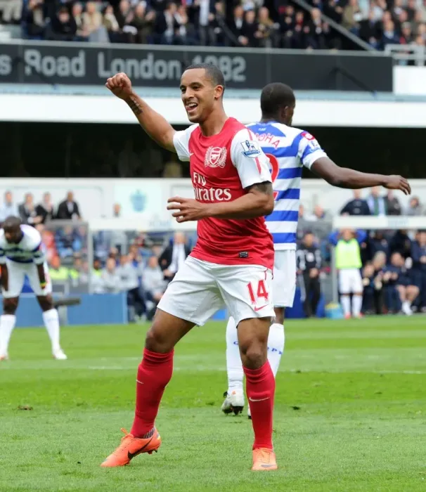 Framed Print : Theo Walcott's Euphoric Goal: Arsenal's Triumph at Queens Park Rangers, Premier League 2011-12 Framed Print : Theo Walcott's Euphoric Goal: Arsenal's Triumph at Queens Park Rangers, Premier League 2011-12