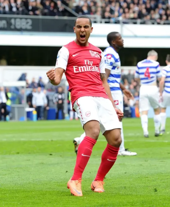Framed Print : Theo Walcott's Euphoric Goal Celebration: Arsenal's Victory at Queens Park Rangers, Premier League 2011-12 Framed Print : Theo Walcott's Euphoric Goal Celebration: Arsenal's Victory at Queens Park Rangers, Premier League 2011-12