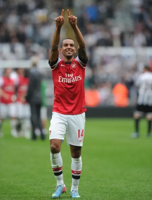 Framed Print : Theo Walcott's Euphoric Moment: Arsenal's Triumph over Newcastle United (2012-13)