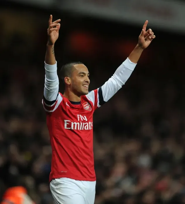 Framed Print : Theo Walcott's Five-Goal Cross: Arsenal's Dominance Over Newcastle United (2012-13)