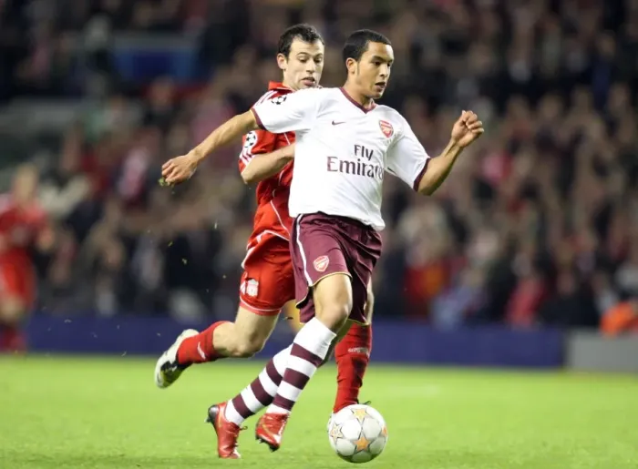 Framed Print : Theo Walcott's Game-Changing Moment: Outmaneuvering Mascherano to Set Up Adebayor's Goal in Arsenal's UEFA Champions League Battle at Anfield Framed Print : Theo Walcott's Game-Changing Moment: Outmaneuvering Mascherano to Set Up Adebayor's Goal in Arsenal's UEFA Champions League Battle at Anfield