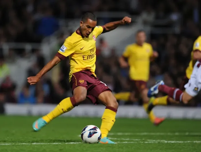 Framed Print : Theo Walcott's Game-Changing Stunner: Arsenal's Victory Goal vs. West Ham United (2012-13)