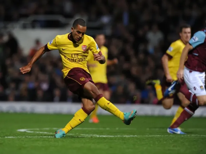 Framed Print : Theo Walcott's Game-Changing Stunner: Arsenal's Victory Goal Against West Ham United (2012-13)