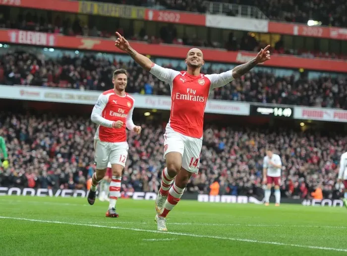 Framed Print : Theo Walcott's Hat-Trick: Arsenal's Triumph Over Aston Villa in the Premier League 2014-15 - Arsenal's Star Forward Scores Three Goals in One Game, Leading Arsenal to Victory against Aston Villa