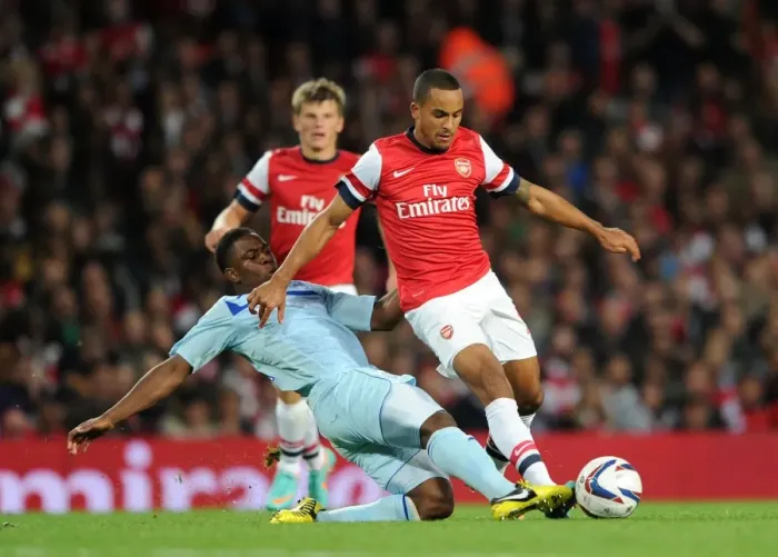 Framed Print : Theo Walcott's Hat-Trick: Arsenal Crushes Coventry City 6-1 in Capital One Cup