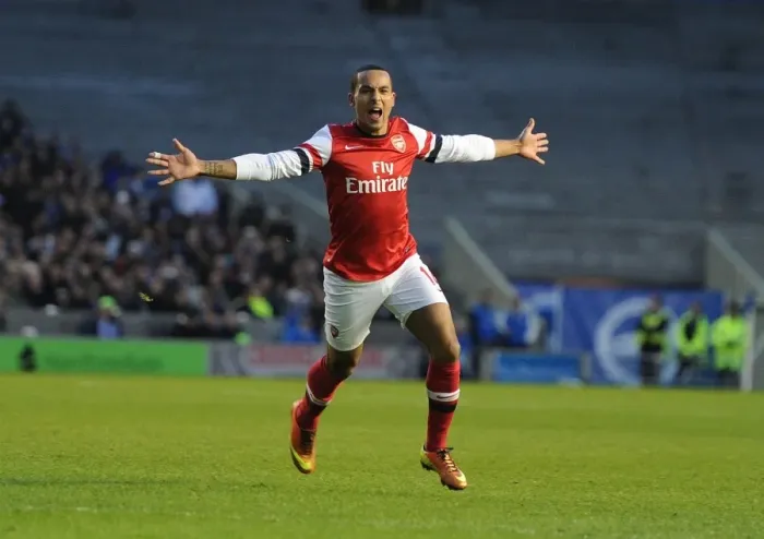 Framed Print : Theo Walcott's Hat-Trick: Arsenal Triumphs Over Brighton in FA Cup