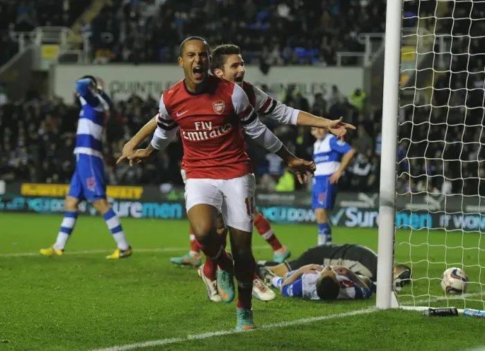 Framed Print : Theo Walcott's Hat-Trick: Arsenal's Commanding Victory over Reading in Capital One Cup