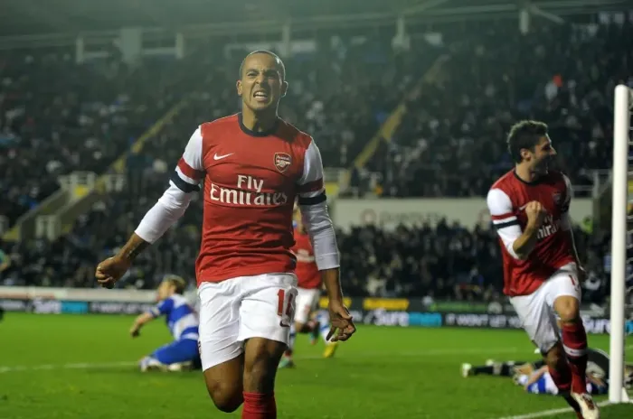 Framed Print : Theo Walcott's Hat-Trick: Arsenal's Dominance over Reading in Capital One Cup