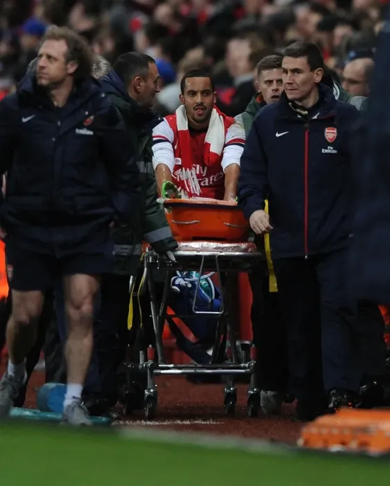 Framed Print : Theo Walcott's Injury Marrs Arsenal in FA Cup Clash Against Tottenham