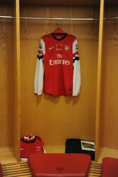 Framed Print : Theo Walcott's Poppy Shirt in Arsenal Changing Room (Arsenal vs Fulham, 2012-13)