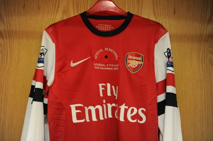 Framed Print : Theo Walcott's Poppy Shirt in Arsenal Changing Room (Arsenal vs Fulham, 2012-13)