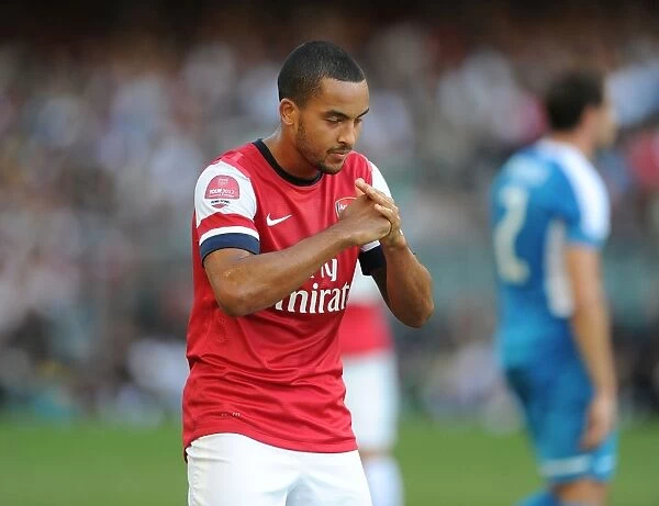 Theo Walcott's Respectful Goal: Arsenal's Traditional Chinese Victory Celebration in Hong Kong, 2012