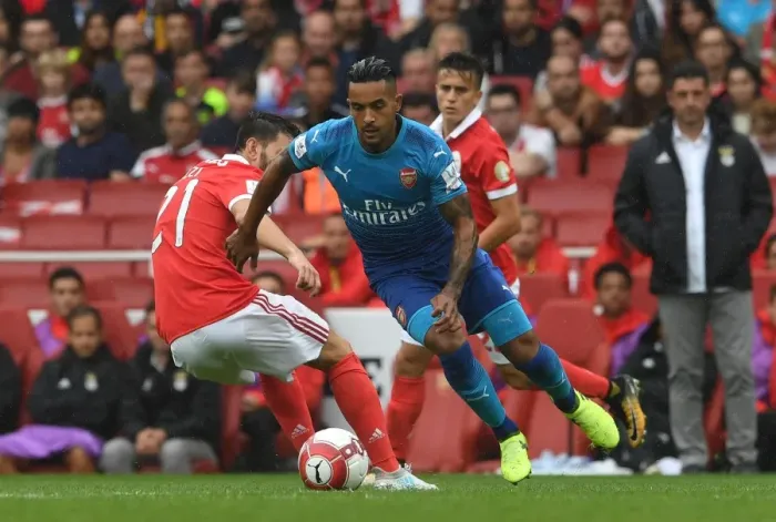 Framed Print : Theo Walcott's Slick Move: Arsenal's Emirates Cup Win against Benfica