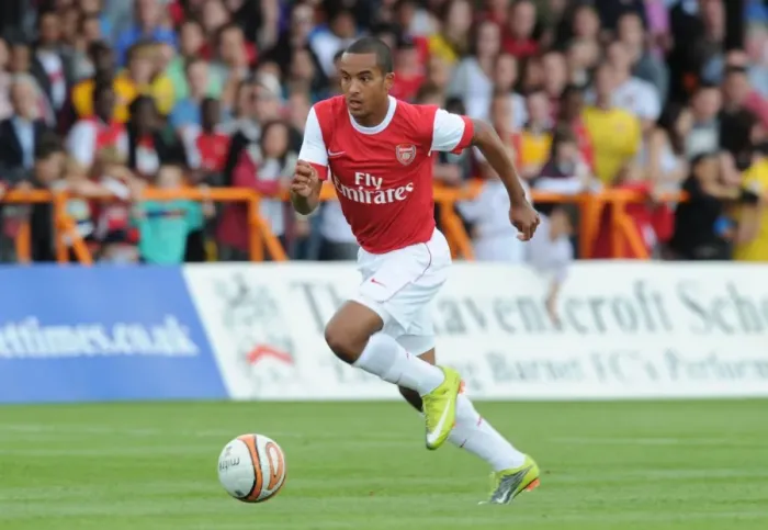 Framed Print : Theo Walcott's Star Performance: Arsenal Dominates Barnet 4-0 in Pre-Season Friendly
