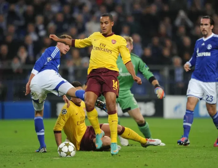 Framed Print : Theo Walcott's Stunning Goal: Arsenal's Victory over Schalke 04 in the UEFA Champions League (2012-13) - Walcott Outmaneuvers Howedes Framed Print : Theo Walcott's Stunning Goal: Arsenal's Victory over Schalke 04 in the UEFA Champions League (2012-13) - Walcott Outmaneuvers Howedes