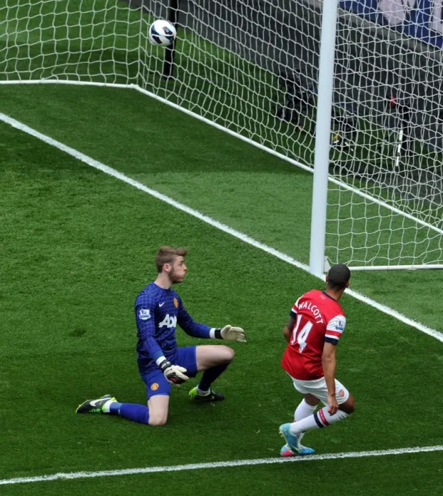 Framed Print : Theo Walcott's Stunning Goal: Arsenal's Triumph Over Manchester United and David De Gea (2012-13) Framed Print : Theo Walcott's Stunning Goal: Arsenal's Triumph Over Manchester United and David De Gea (2012-13)