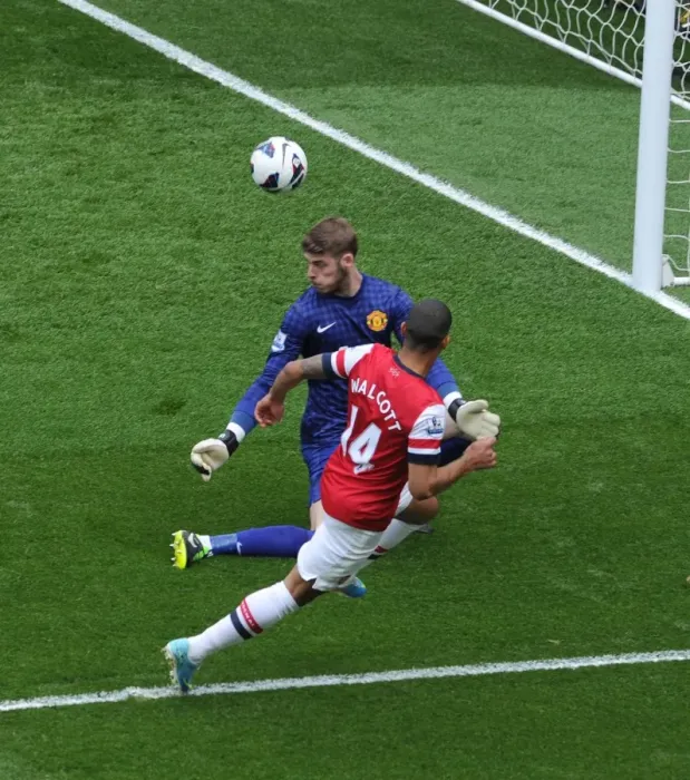 Framed Print : Theo Walcott's Stunning Goal: Arsenal's Victory Over Manchester United's David De Gea (2012-13) Framed Print : Theo Walcott's Stunning Goal: Arsenal's Victory Over Manchester United's David De Gea (2012-13)