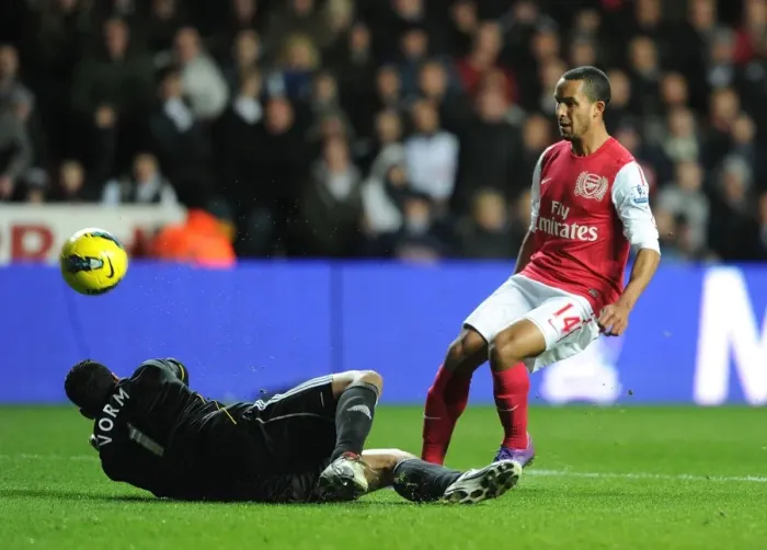 Framed Print : Theo Walcott's Stunning Goal Past Michel Vorm: A Memorable Moment for Arsenal vs Swansea City (2011-12)