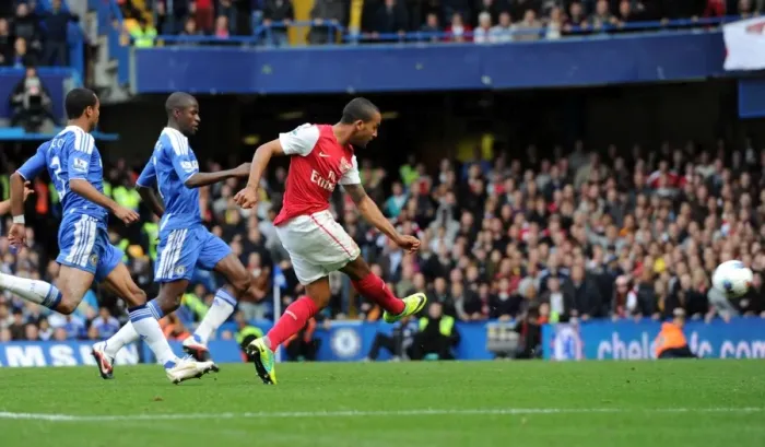 Framed Print : Theo Walcott's Thriller: Arsenal's Comeback Victory Over Chelsea in the Premier League (3-5)