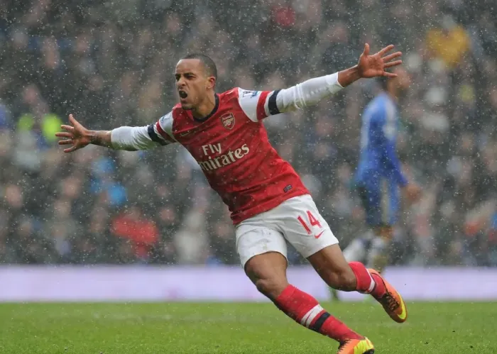 Framed Print : Theo Walcott's Thrilling Goal: Arsenal Triumphs Over Chelsea in Premier League Rivalry (2012-13)
