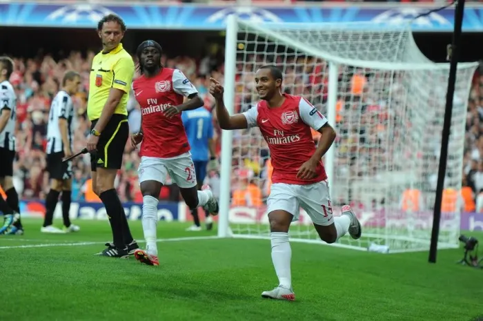 Framed Print : Theo Walcott's Thrilling Goal: Arsenal's Champions League Triumph Over Udinese (2011-12)