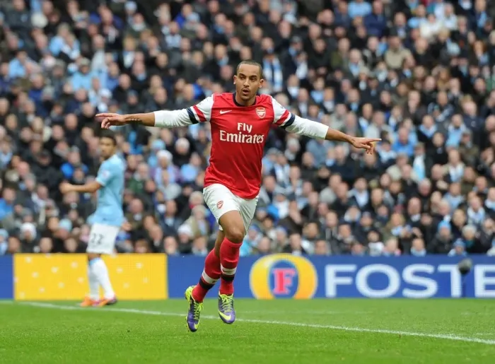 Framed Print : Theo Walcott's Thrilling Goal: Arsenal's Triumph Over Manchester City (Premier League 2013-14)