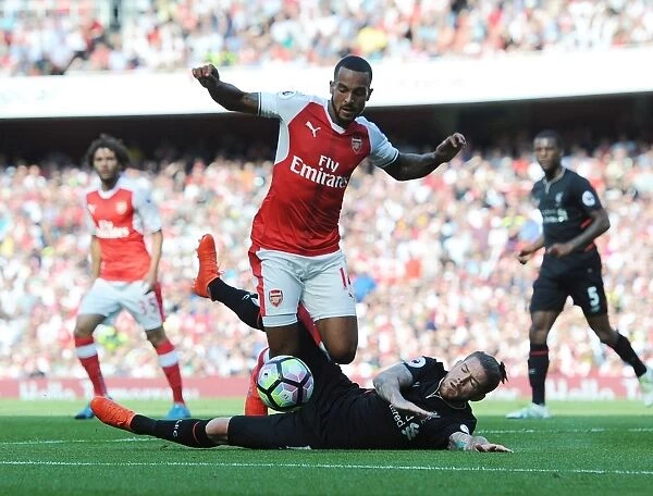 Theo Walcott's Tripping Controversy: A Turning Point in the Arsenal-Liverpool Rivalry
