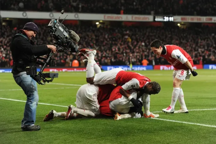 Framed Print : Theo Walcott's Triumphant Goal: Arsenal's Big Three Celebrate 3-1 Over Chelsea Framed Print : Theo Walcott's Triumphant Goal: Arsenal's Big Three Celebrate 3-1 Over Chelsea