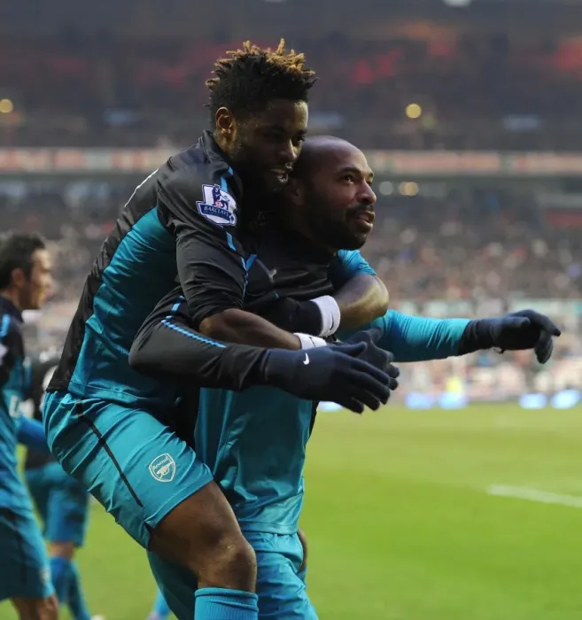 Framed Print : Thierry Henry and Alex Song: Arsenal's Unforgettable Victory Celebration vs. Sunderland, Premier League