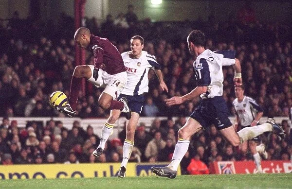Thierry Henry (Arsenal) Brian Priske and Andy O Brien (Portsmouth)