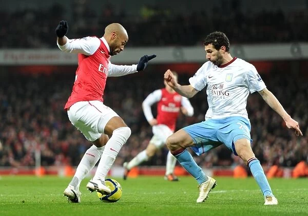 Thierry Henry (Arsenal) Carlos Cuellar (Villa). Arsenal 3:2 Aston Villa