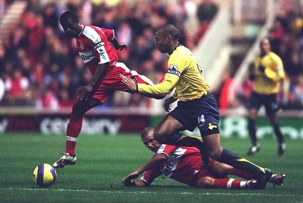 Thierry Henry (Arsenal) George Boateng and Lee Cattermole (Middlesbrough) Middlesbrough 1