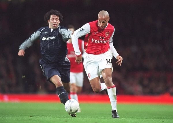 Thierry Henry (Arsenal) Ivan Campo (Bolton)