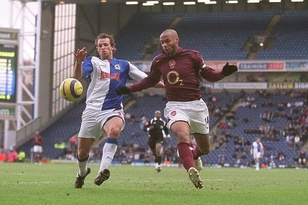Thierry Henry (Arsenal) Lucas Neill (Blackburn). Blackburn Rovers 1:0 Arsenal