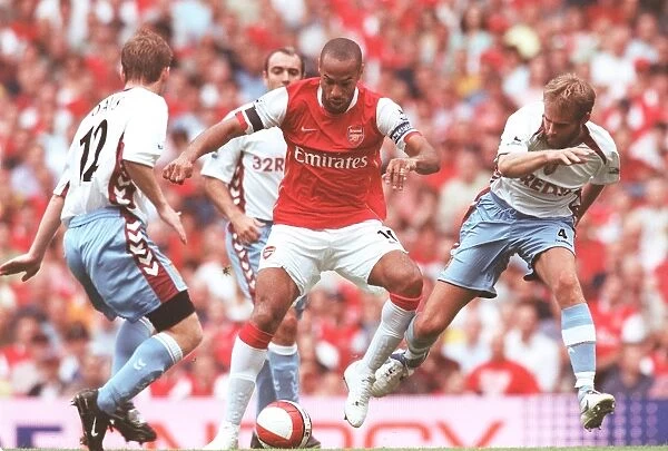 Thierry Henry (Arsenal) Olof Mellberg (Villa)