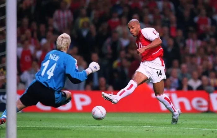 Framed Print : Thierry Henry (Arsenal) has his shoot blocked by Anti Niemi (Southampton) Framed Print : Thierry Henry (Arsenal) has his shoot blocked by Anti Niemi (Southampton)